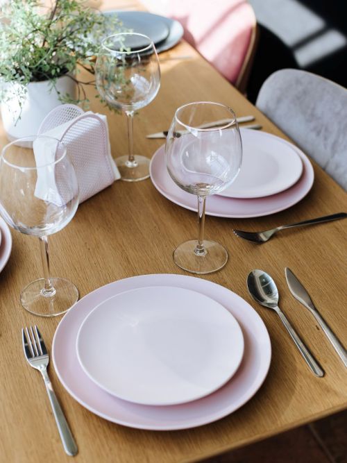 table set with plates and glasses