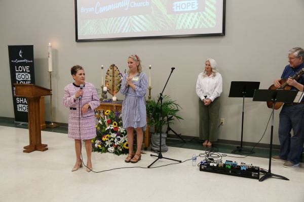 Bishop Harvey speaks during service at Bryan Community Church