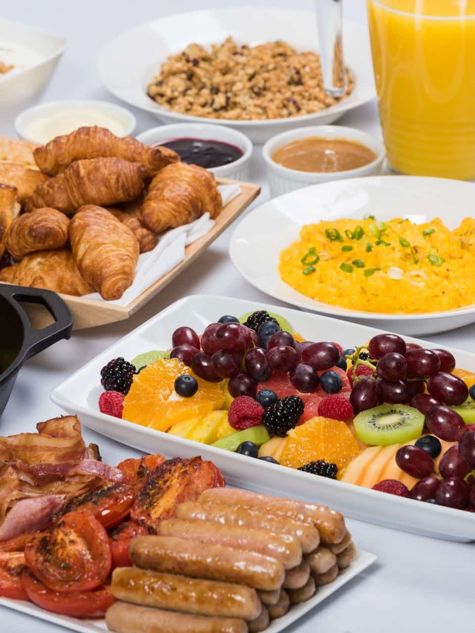 table full of breakfast foods